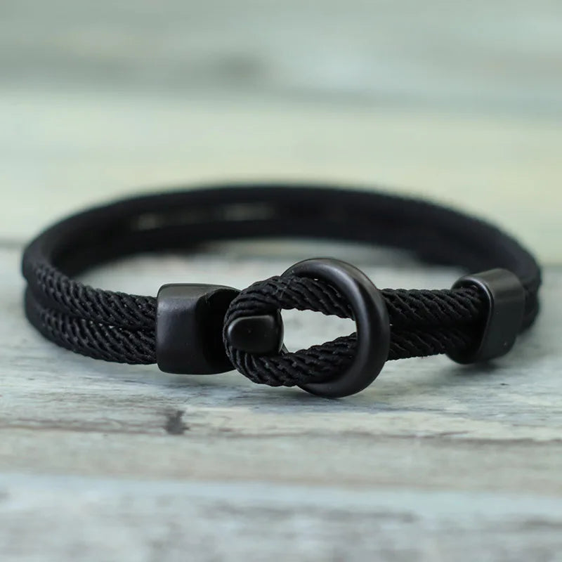 A red and black bracelet with a dual-layer design and a black clasp.